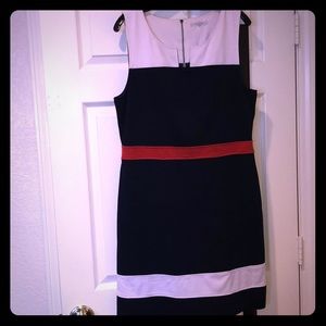 Block color dress. Navy, white, and orange.
